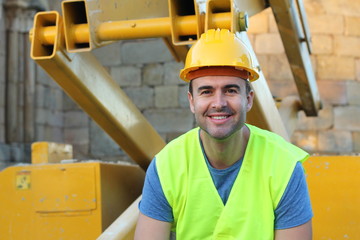 Sexy young construction worker smiling 