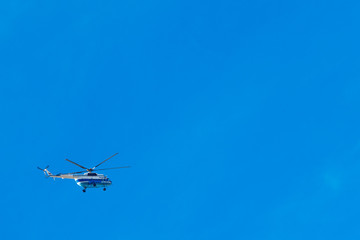 Fototapeta na wymiar helicopter in blue sky