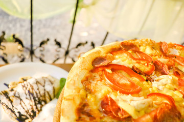 Traditional european dinner out at street summer cafe. Italian pizza and thin pancake. Top view. Copyspace