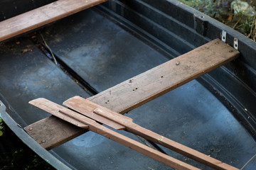 Paddles of fishing boats. Old fishing accessories in fishing boats.
