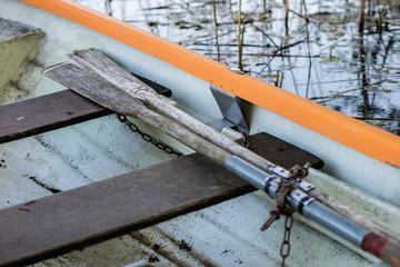 Paddles of fishing boats. Old fishing accessories in fishing boats.