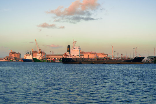 Logistics and transportation of offshore oil and gas industry, ships at port.