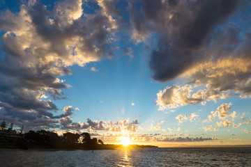 Sunset with rays and round cloudscape at Cowes, Phillip Island, Australia