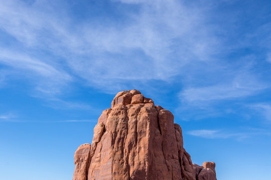 Orange rock against blue sky