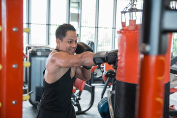 Boxer doing training on a punching bag