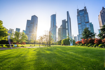 modern office building with green lawn in shanghai park