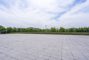 empty marble floor with panoramic city skyline