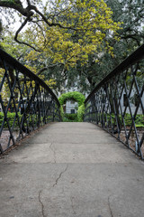 walking bridge with wrought iron railing