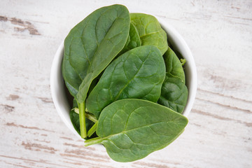 Green spinach containing natural minerals, vitamins and fiber, healthy nutrition concept