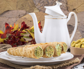 Sweet Bakery Food Puff Roll with Cream Also Know As Homemade Cream Roll, Puff Pastry, Swiss And Jelly Roll is a type of sponge cake roll filled with whipped cream, jam