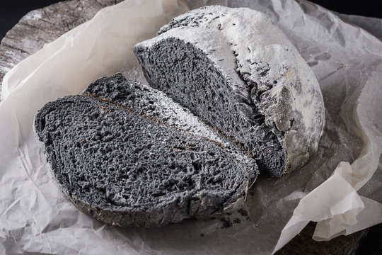 Rustic bread and slices inusual black color