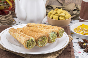 Sweet Bakery Food Puff Roll with Cream Also Know As Homemade Cream Roll, Puff Pastry, Swiss And Jelly Roll is a type of sponge cake roll filled with whipped cream, jam
