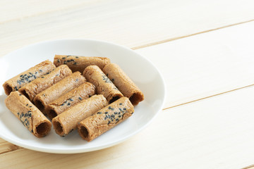 Coconut rolls on a white dish