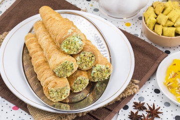 Sweet Bakery Food Puff Roll with Cream Also Know As Homemade Cream Roll, Puff Pastry, Swiss And Jelly Roll is a type of sponge cake roll filled with whipped cream, jam