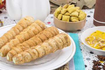 Sweet Bakery Food Puff Roll with Cream Also Know As Homemade Cream Roll, Puff Pastry, Swiss And Jelly Roll is a type of sponge cake roll filled with whipped cream, jam