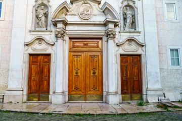 Fototapeta na wymiar Old antique greenish door in Lisbon Portugal
