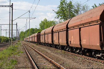 Fototapeta na wymiar Old rusty wagons parking on railway yard