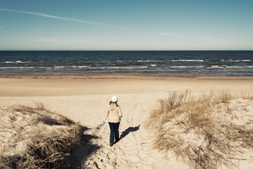 Vintage look Baltic beach in cold day.