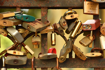 The tradition of lovers. Locks on the railings of the bridge.