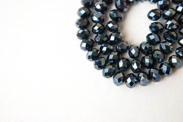 Blue Green Colorful Shinny Crystal Beads Glass Isoalted on White Background Copy space Hobby Handmade Fashion Beauty