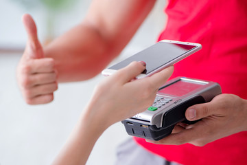 Concept of paying with POS terminal