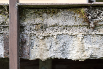 Damaged wet front of the balcony layers due to improper construction