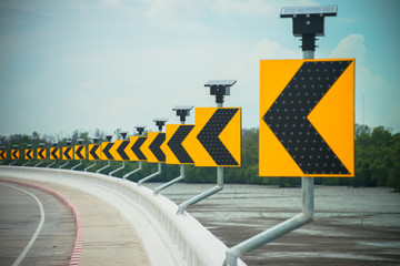 Yellow rifle symbolizes the curve of the road in Thailand.