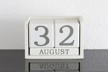 White block calendar present date 32 and month August - Extra day