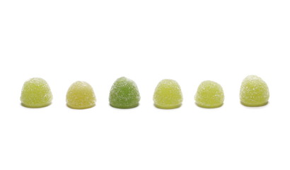 Green jelly, gummy sugar candies isolated on white background 