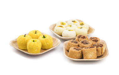 Indian Sweet Peda with Bhakarwadi or Apple Shaped peda Also Know as bakarwadi, bakarvadi, pedha or peday is a prepared in thick, semi-soft pieces. the main ingredients are khoya, sugar