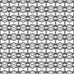 Fototapeta premium Design for printing on fabric, textile, paper, wrapper. Authentic geometric background in repeat. Black and white Seamless pattern
