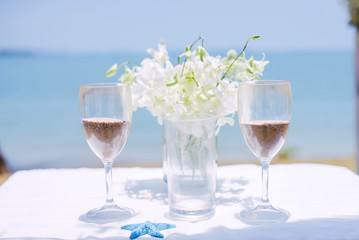 Wedding Sand Ceremony on the table by the sea.