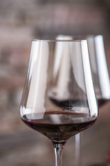 Close-up two cups with red wine in restaurant