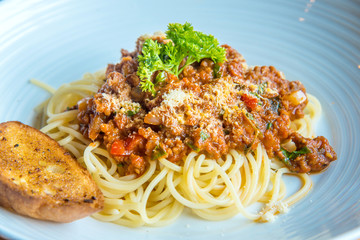 delicious Italian spaghetti pasta and toast.