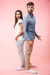 Full length portrait of a frustrated young couple