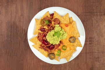 Nachos with cheese, traditional Mexican snack, with copyspace