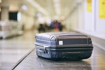 Suitcase on baggage claim