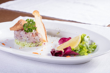 Холодная закуска из рыбы с лемоном. Cold appetizer from fish with a lemon 