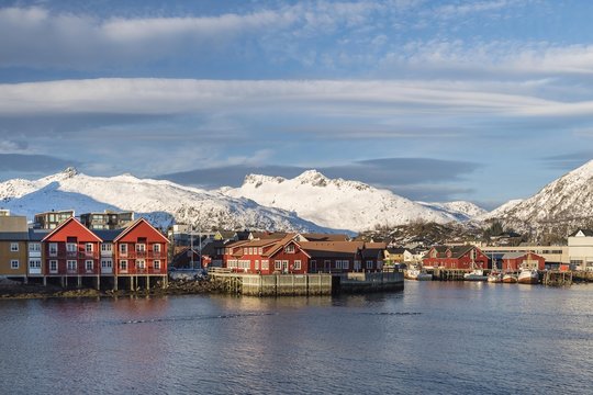 Townscape Svolvaer, harbour, snow-covered mountains in the background, Austvagoy, Lofoten, Norway, Europe