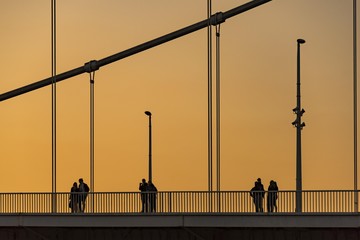 Persons on the Chain Bridge at dusk, Budapest, Hungary, Europe