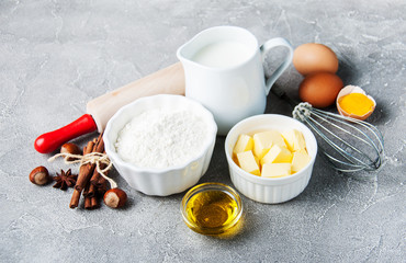 Obraz na płótnie Canvas Kitchen table with baking ingredients
