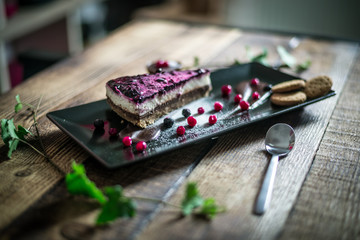 Homemade cheesecake with fresh berries and chocolate