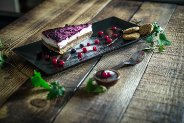 Homemade cheesecake with fresh berries and chocolate