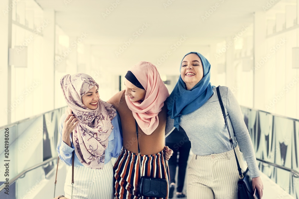 Sticker islamic women friends walking and discussing together