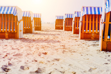 Beach Chairs on sandy beach on Travemuende, Luebeck Bay, Germany