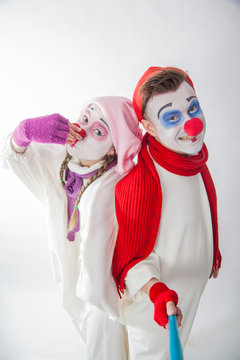 emotional mime guy and girl take pictures of themselves on the phone. Human emotions