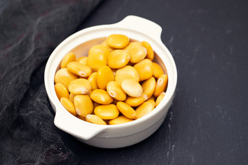 salted lupins in white bowl