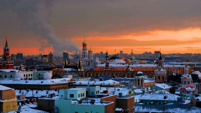 Moscow, Russia. Aerial view of popular landmarks - Kremlin walls, Saint Basil Cathedral and others - in Moscow, Russia at sunset with sky