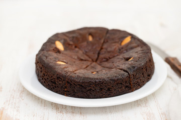 traditional honey cake of Madeira, Portugal on white plate
