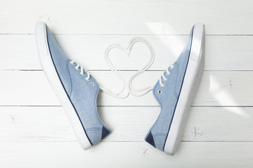 Sport denim sneakers, heart and lover concept.